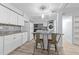 Modern kitchen with white cabinets and granite countertops at 7002 Longstreet Dr # C, Raleigh, NC 27615