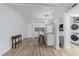 Kitchen with white cabinets, granite counters, and island at 7002 Longstreet Dr # C, Raleigh, NC 27615