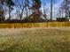 Large backyard with wooden privacy fence at 7434 Randshire Way, Raleigh, NC 27616