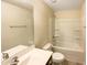 Clean bathroom with a bathtub, shower, and vanity at 7434 Randshire Way, Raleigh, NC 27616