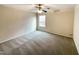 Spacious bedroom featuring a ceiling fan and window blinds at 7434 Randshire Way, Raleigh, NC 27616