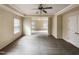 Spacious bedroom with neutral walls and carpet, and access to another room at 7434 Randshire Way, Raleigh, NC 27616