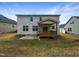 Two-story house with a covered back porch and a fenced backyard at 7434 Randshire Way, Raleigh, NC 27616