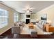 Virtually staged living room features built-in shelving and fireplace at 7434 Randshire Way, Raleigh, NC 27616