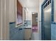 Bathroom with blue tile, vanity, and shower at 809 Jeffreys Rd, Rocky Mount, NC 27804