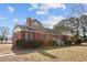 Brick ranch house with a landscaped yard at 809 Jeffreys Rd, Rocky Mount, NC 27804