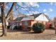 Side view of brick ranch house with landscaping at 809 Jeffreys Rd, Rocky Mount, NC 27804