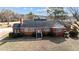 Brick ranch house with a spacious yard and mature trees at 809 Jeffreys Rd, Rocky Mount, NC 27804