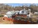 Brick house with a detached barn and a brick wall at 809 Jeffreys Rd, Rocky Mount, NC 27804
