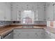 Bright kitchen features ample cabinetry and butcher block countertops at 809 Jeffreys Rd, Rocky Mount, NC 27804