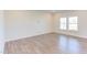Living Room with wood-look floors and neutral walls at 104 Barn Door Dr, Lillington, NC 27546