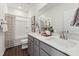 Modern bathroom with double sinks, granite countertops, and a shower-tub combination at 107 Ailey Brook Way # 200, Wake Forest, NC 27587