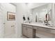 Modern bathroom with a large mirror, vanity with drawers, and a separate water closet at 107 Ailey Brook Way # 200, Wake Forest, NC 27587