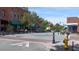 Picturesque downtown intersection with brick sidewalks, vintage lampposts, and shops with green awnings at 107 Ailey Brook Way # 200, Wake Forest, NC 27587