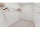 Spacious walk-in closet with ample shelving and storage options for clothing and accessories at 107 Ailey Brook Way # 200, Wake Forest, NC 27587
