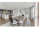 Elegant dining room with a large table, comfortable chairs, and natural light at 109 Ailey Brook Way # 200, Wake Forest, NC 27587