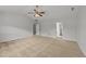 Bright bedroom with ceiling fan and carpet at 1201 Dexter Ridge Dr, Holly Springs, NC 27540