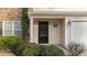 Exterior view of front door and garage at 1201 Dexter Ridge Dr, Holly Springs, NC 27540