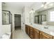 Bathroom with double sink vanity and a glass shower at 1201 Rivermead Ln, Wake Forest, NC 27587