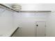 This walk-in closet is a blank slate, featuring ample shelving and a classic design, ready for organization at 1201 Rivermead Ln, Wake Forest, NC 27587