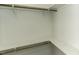 Bright walk-in closet offers ample storage space with shelving and clothing rods at 1201 Rivermead Ln, Wake Forest, NC 27587