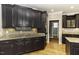 Well-lit kitchen with granite counters and stainless steel appliances at 1201 Rivermead Ln, Wake Forest, NC 27587