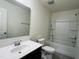 Clean bathroom with tub shower, vanity and toilet at 1312 Anthony Wood Ct, Fuquay Varina, NC 27526