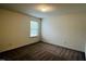 Simple bedroom with carpeted floor and window at 1312 Anthony Wood Ct, Fuquay Varina, NC 27526