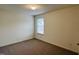 Bright bedroom with carpeted floor and window at 1312 Anthony Wood Ct, Fuquay Varina, NC 27526