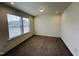 Bright bedroom with carpet and two windows at 1312 Anthony Wood Ct, Fuquay Varina, NC 27526