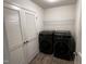 Laundry room with washer, dryer, and storage at 1312 Anthony Wood Ct, Fuquay Varina, NC 27526