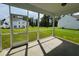 Spacious screened porch overlooking the backyard and neighborhood at 1312 Anthony Wood Ct, Fuquay Varina, NC 27526