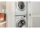 Stackable washer and dryer in convenient laundry room at 1413 Big Falls Dr, Wendell, NC 27591