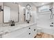 Bathroom with double vanity, granite countertop, and black accents at 1647 Old Dam Rd, Kenly, NC 27542