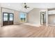 Spacious living area with hardwood floors and double doors at 1647 Old Dam Rd, Kenly, NC 27542