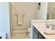 Clean bathroom with shower, toilet, and a single vanity with marble top at 166 Gulley Glen Dr, Garner, NC 27529