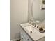 Modern bathroom with a vanity and oval mirror at 166 Gulley Glen Dr, Garner, NC 27529
