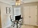 Bedroom with desk, chair and double doors at 166 Gulley Glen Dr, Garner, NC 27529