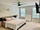 Spacious bedroom with large windows and ceiling fan at 166 Gulley Glen Dr, Garner, NC 27529