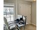 Bright bedroom with a desk and large window at 166 Gulley Glen Dr, Garner, NC 27529