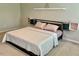 Spacious bedroom with large bed, stylish wall decor, and ample natural light at 166 Gulley Glen Dr, Garner, NC 27529