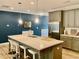 Modern kitchen with stainless steel appliances and an island at 166 Gulley Glen Dr, Garner, NC 27529