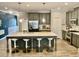 Modern kitchen with stainless steel appliances and an island at 166 Gulley Glen Dr, Garner, NC 27529