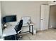 Modern home office featuring a dual monitor setup and ample workspace at 166 Gulley Glen Dr, Garner, NC 27529