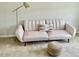 Relaxing office area with a pull-out couch, floor lamp, and ottoman at 166 Gulley Glen Dr, Garner, NC 27529