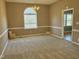 Spacious dining room featuring an arched window and chandelier at 2281 Old Route 22, Kenly, NC 27542