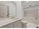 Bathroom with bathtub, toilet and single sink vanity at 232 Lakeview Dr, Sanford, NC 27332