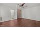Spacious bedroom with hardwood floors and an ensuite bathroom at 232 Lakeview Dr, Sanford, NC 27332