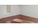 Simple bedroom with hardwood floors and a window at 232 Lakeview Dr, Sanford, NC 27332