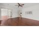 Hardwood floor bedroom with access to sunroom and kitchen at 232 Lakeview Dr, Sanford, NC 27332